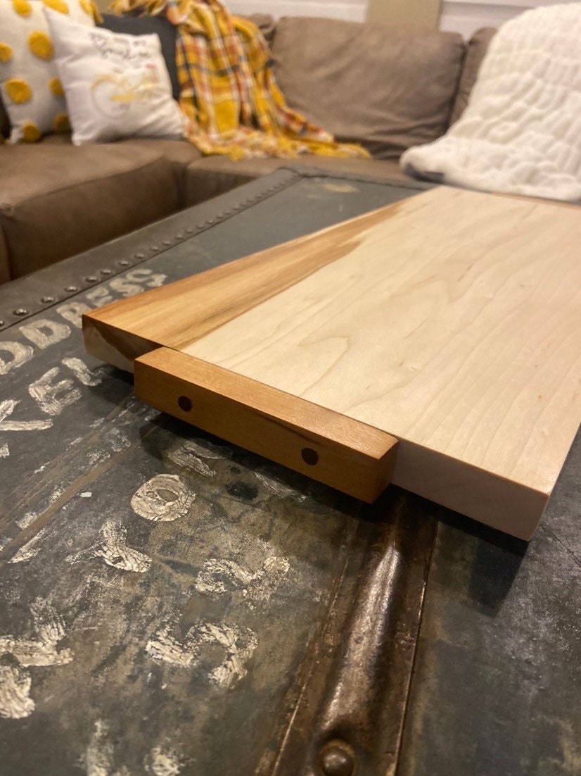 Beautiful live-edge hardwood Maple charcuterie board with wood handles